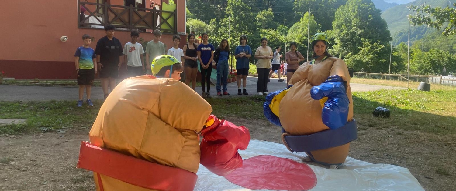 Lucha sumos humor amarillo Asturias